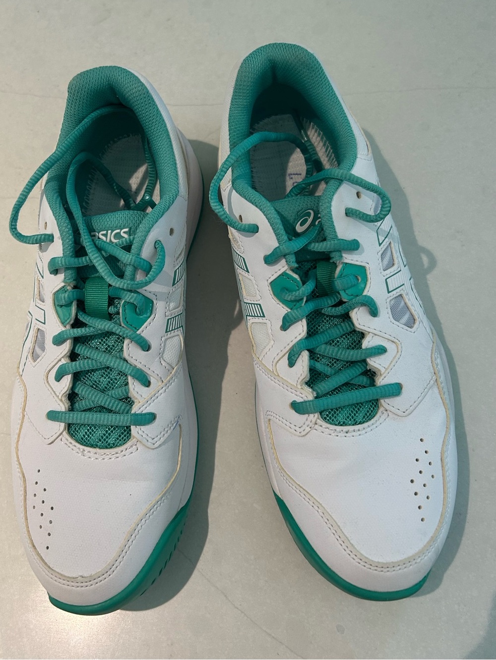 ASICS women’s size 9 court shoes